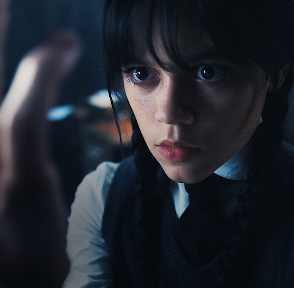 Jenna Ortega as Wednesday Addams in the Netflix series Wednesday pictured with Thing