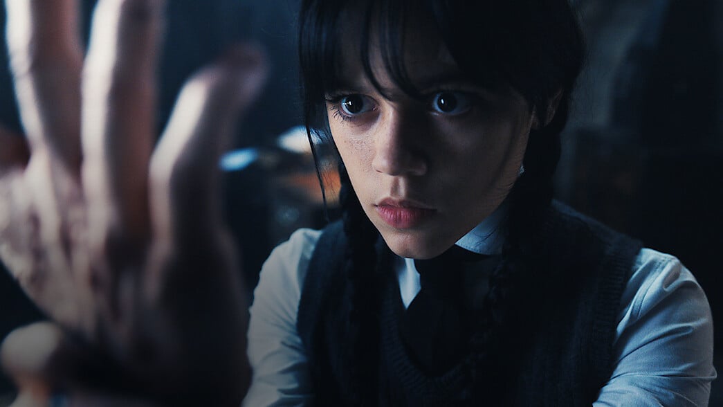 Jenna Ortega as Wednesday Addams in the Netflix series Wednesday pictured with Thing