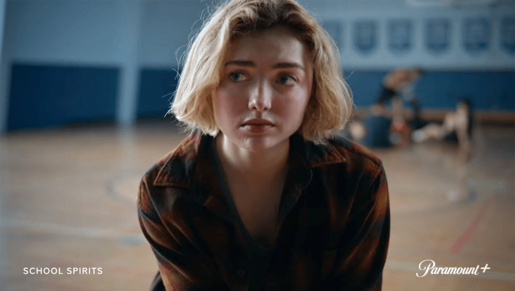 Peyton List as Maddie in school spirits