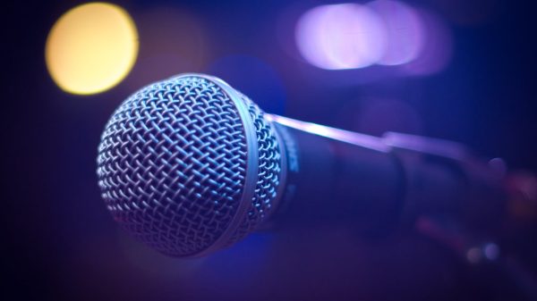 tilt shift photograph of gray and black microphone