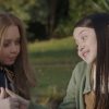 Violet McGraw is seen here with M3gan in a scene from Blumhouse M3gan