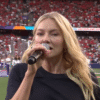 Norwegian pop star Astrid S delivering a hauntingly beautiful performance of Norway's national anthem at the UEFA Women's Euro 2025 opening game.