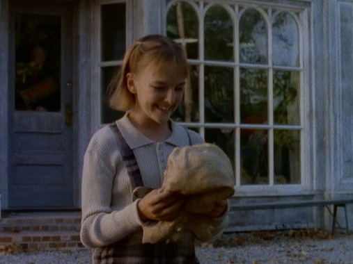 Carly Beth (played by Kathryn Long) holds the eerie mask in Goosebumps’ “The Haunted Mask,” the 1995 two-part premiere that quickly became a Halloween classic for 90s kids.