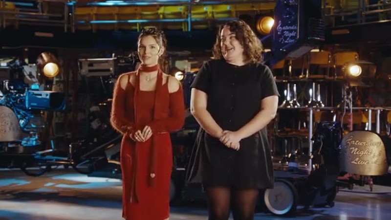 Inde Navarrette and Grace Reiter on the Saturday Night Live stage in the Halloween episode promos