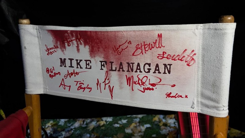 Mike Flanagan's director's chair on the set of Prime Video's Carrie, its canvas signed by the cast