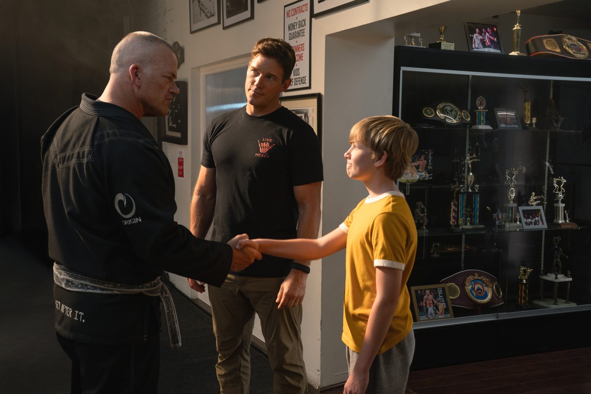 Jocko Willink greets Jude Hill as Chris Pratt looks on in Way of the Warrior Kid