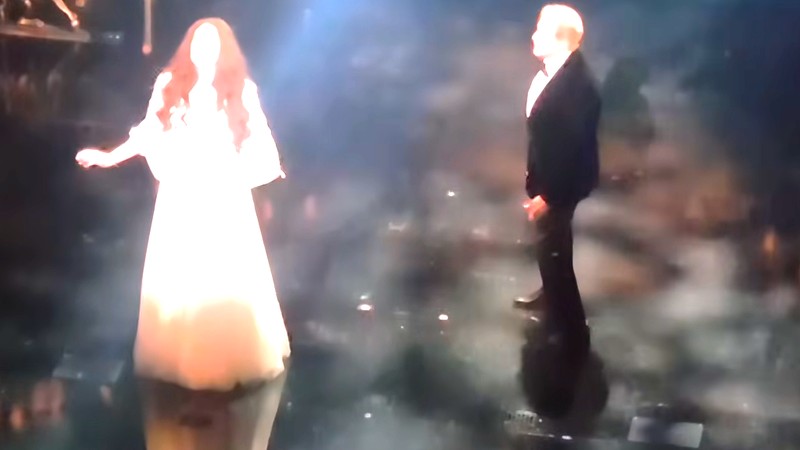Michael Crawford and Sarah Brightman performing on stage at the Phantom of the Opera 40th anniversary gala